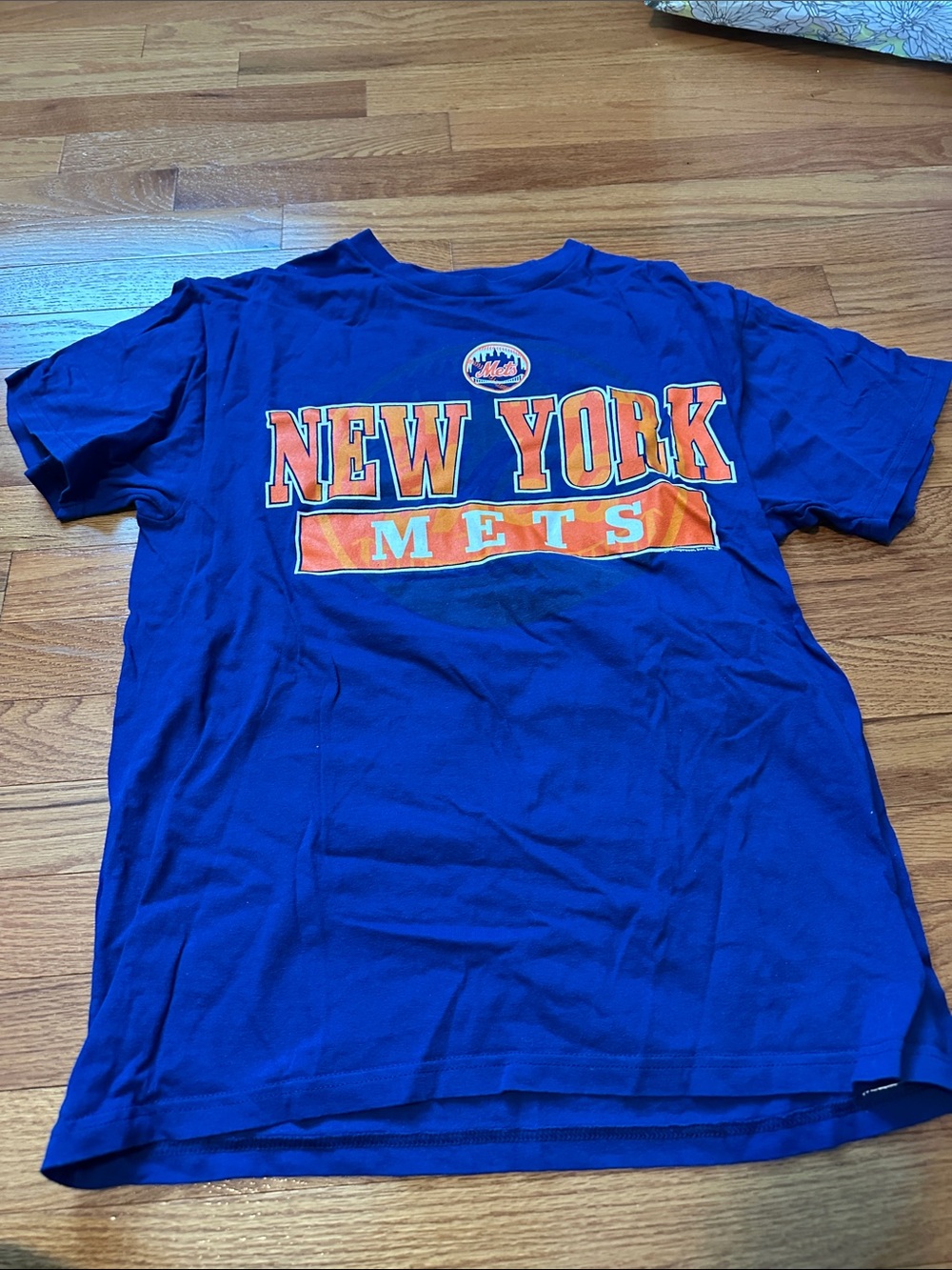 Genuine Merchandise Royal Blue Tee with Orange and White Team Lettering